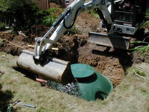 Image-showing-the-compact-installation-of-a-below-ground-WPL-Diamond-small-package-wastewater-sewage-treatment-plant-for-off-mains-drainage-at-a-domestic-application-home.