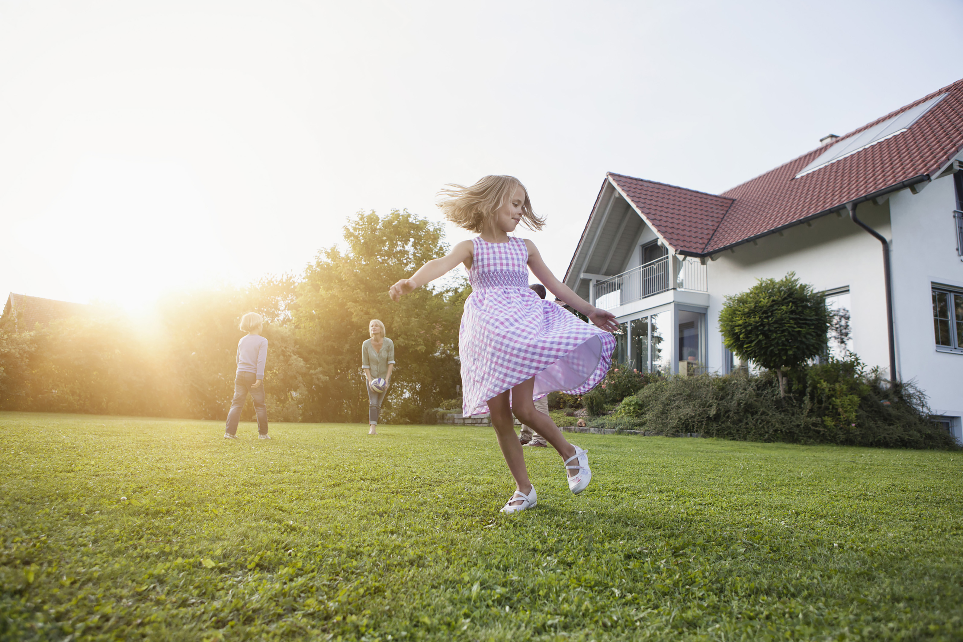 Image-of-a-girl-dancing-in-a-beautiful-garden-with-her-family-enjoying-activities-in-the-background-safe-in-the-knowledge-the-WPL-Diamond-compact-package-sewage-and-wastewater-treatment-plant-is-Simple-Reliable-and-Discreet – UK campaign